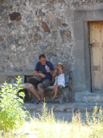 A Swedish grandpa gets a spanish lesson for his local-ish granddaughter while hiding in the shade